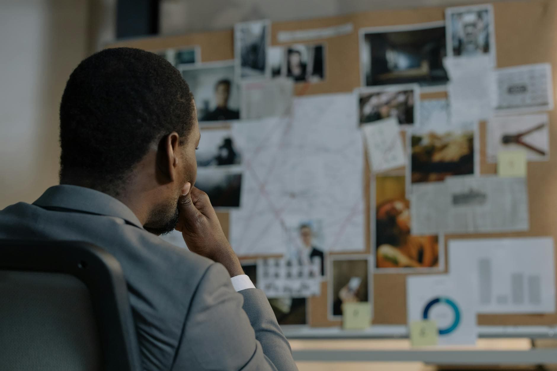 Person looking at planning board with notes and sketches